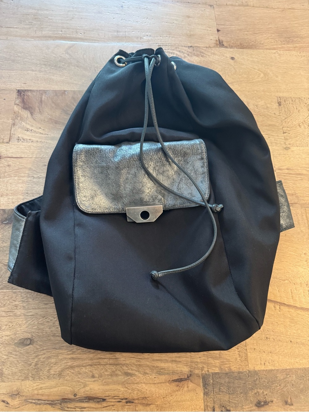 Sarah Pacini nylon leather buckle drastring bag unique minimalist industrial